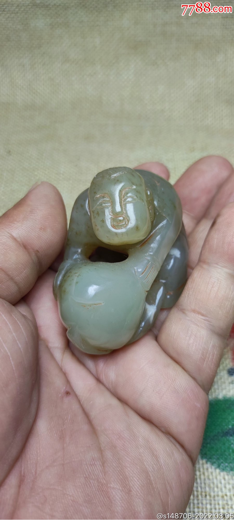 旧藏和田玉俏雕童子献桃手把件