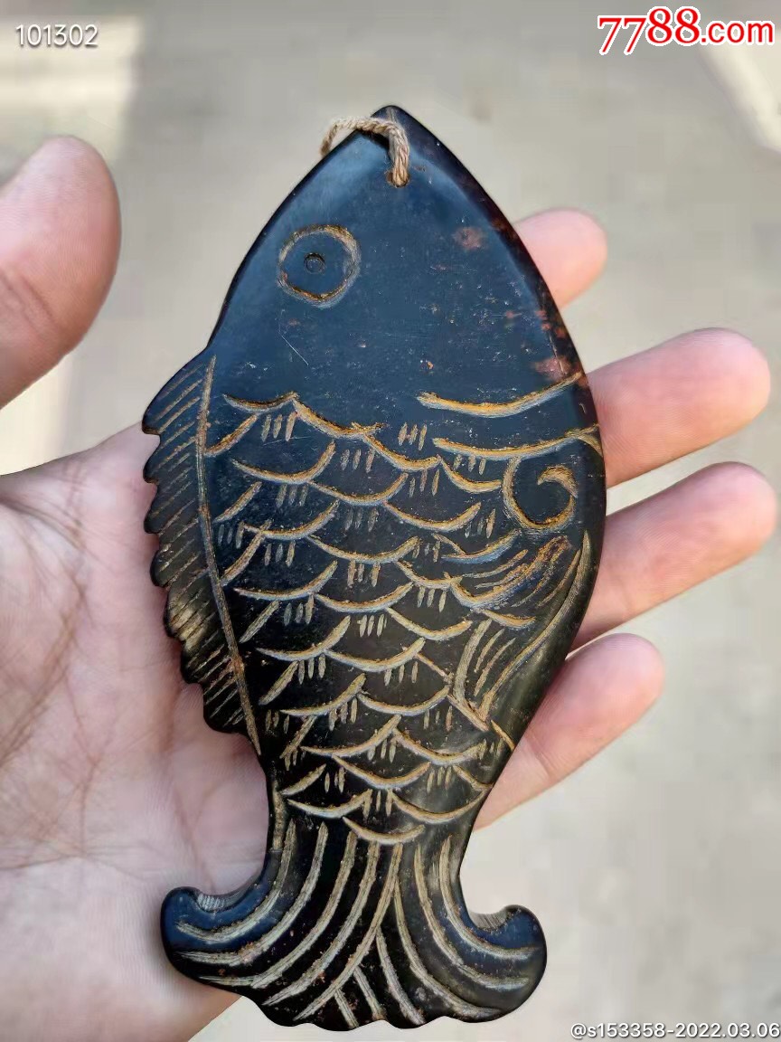 收到老石鱼手把件一个