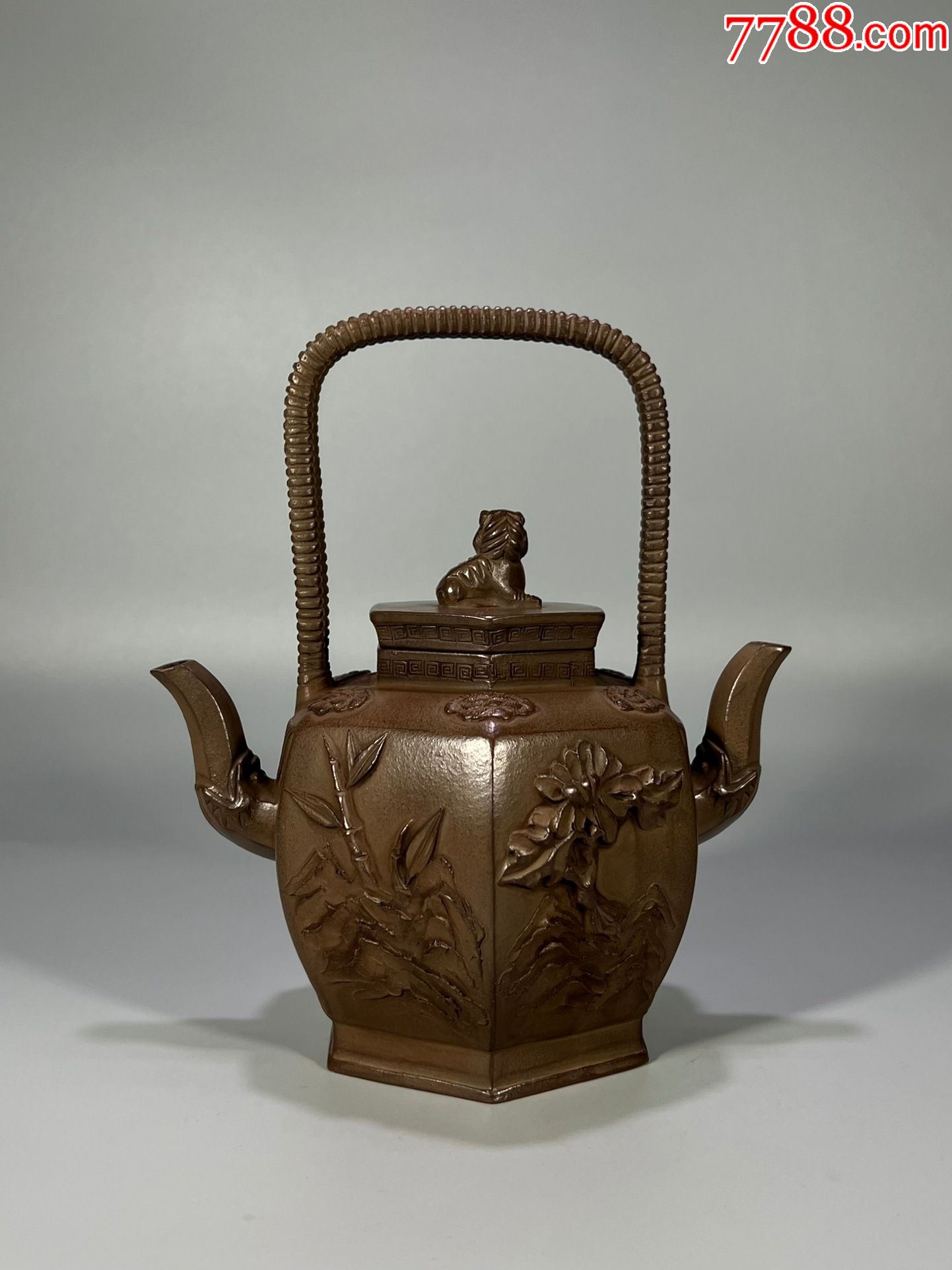 清代元茂紫砂双龙头印花梅兰竹菊提梁壶