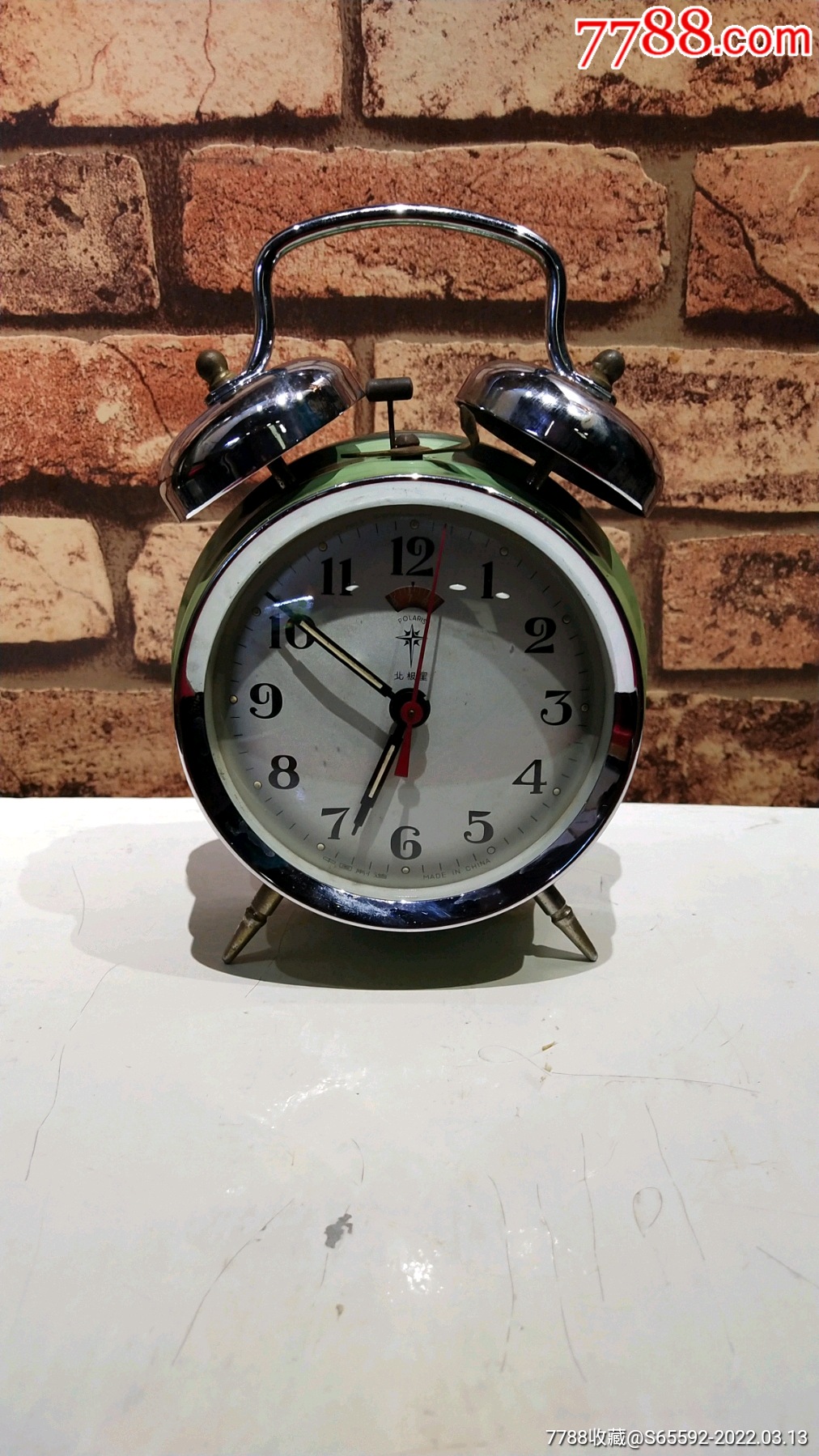收藏级别山东烟台青绿色烤漆北极星纯机械老闹钟老马蹄表