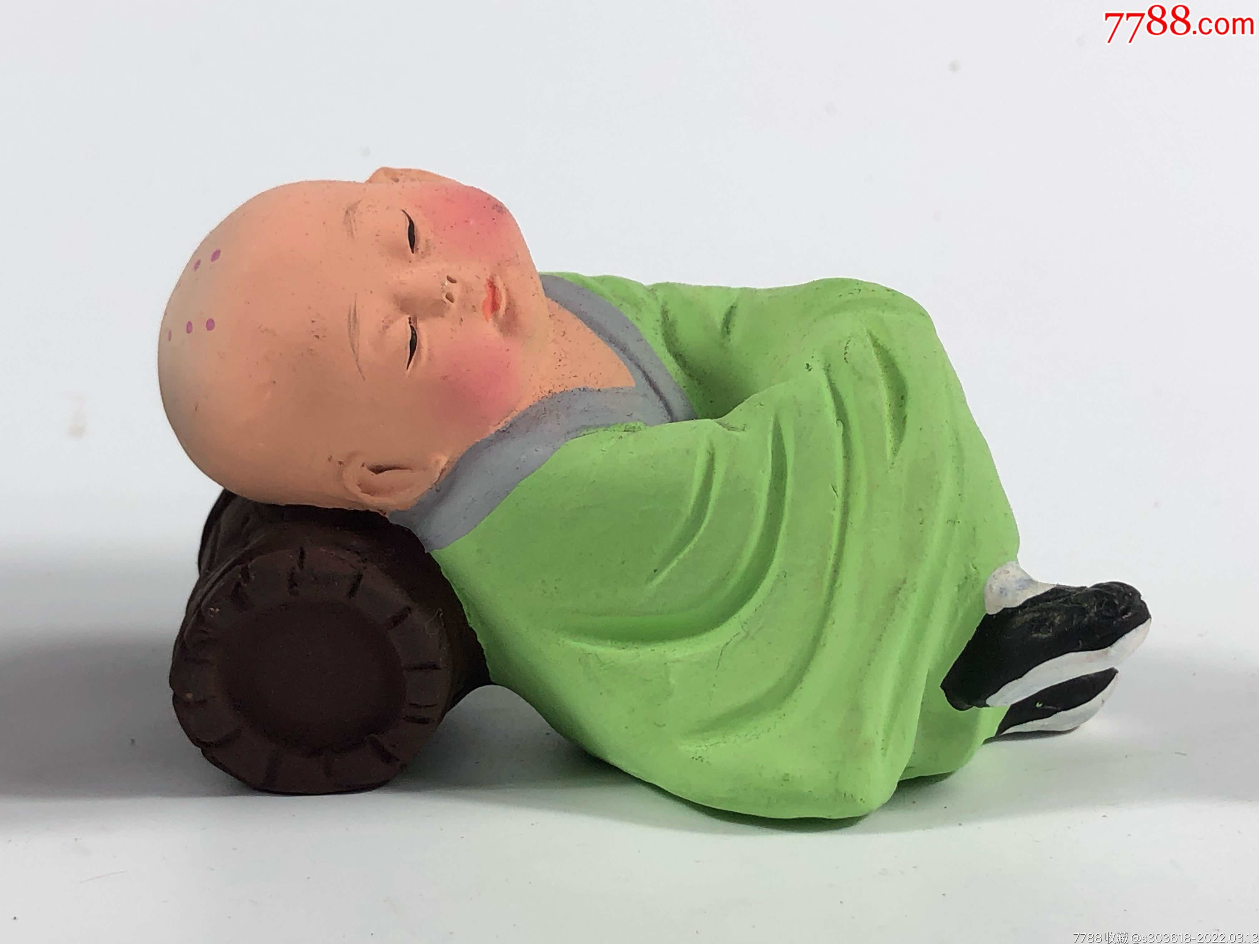 滚动鼠标滚轴,图片即可轻松放大,缩小更多"泥人张/泥塑