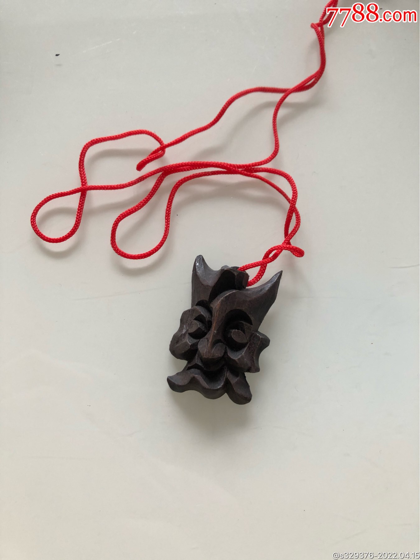 道教文化木雕小吞口兽吞可随身带道教文化木雕随身带小吞口如图