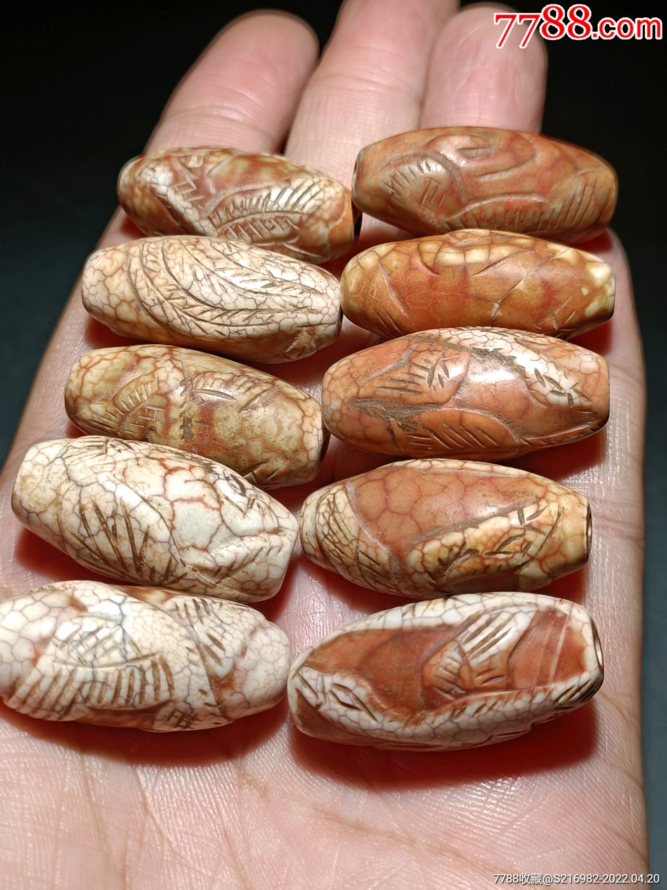 鸡肝玛瑙带浮雕海东青管珠