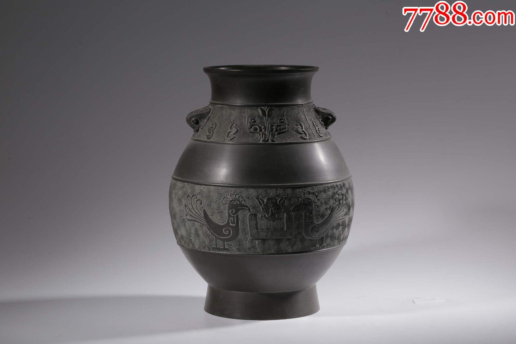 铜制兽面纹双兽耳赏瓶