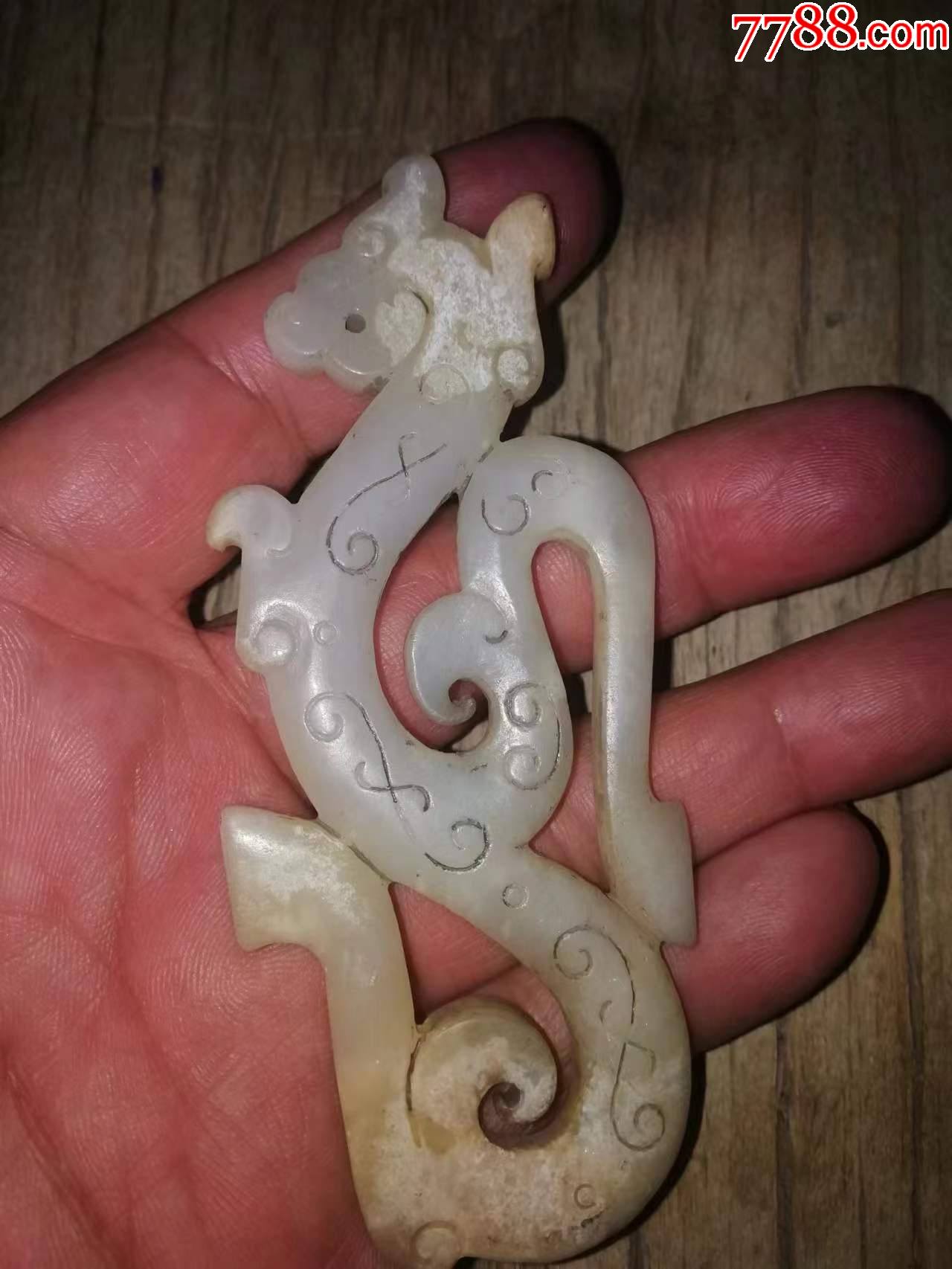 滚动鼠标滚轴,图片即可轻松放大,缩小更多"和田玉