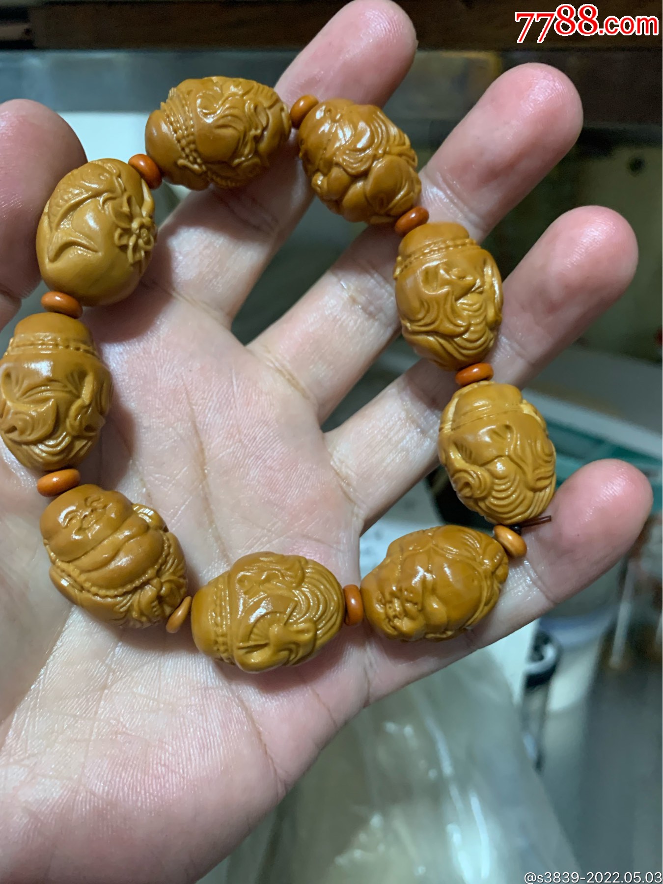 橄榄核雕弥勒佛手串