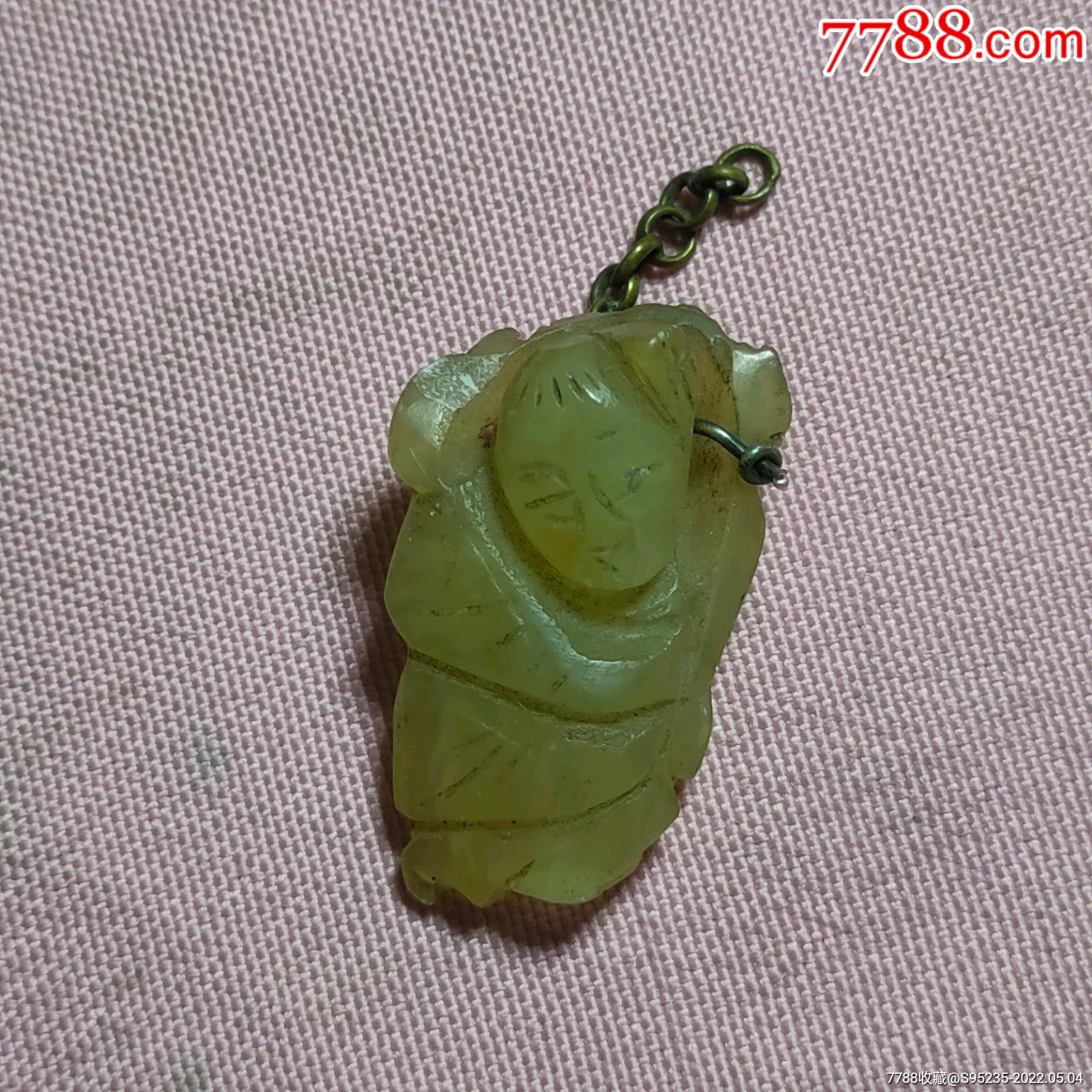 一个包老的清代的送财童子玉挂件