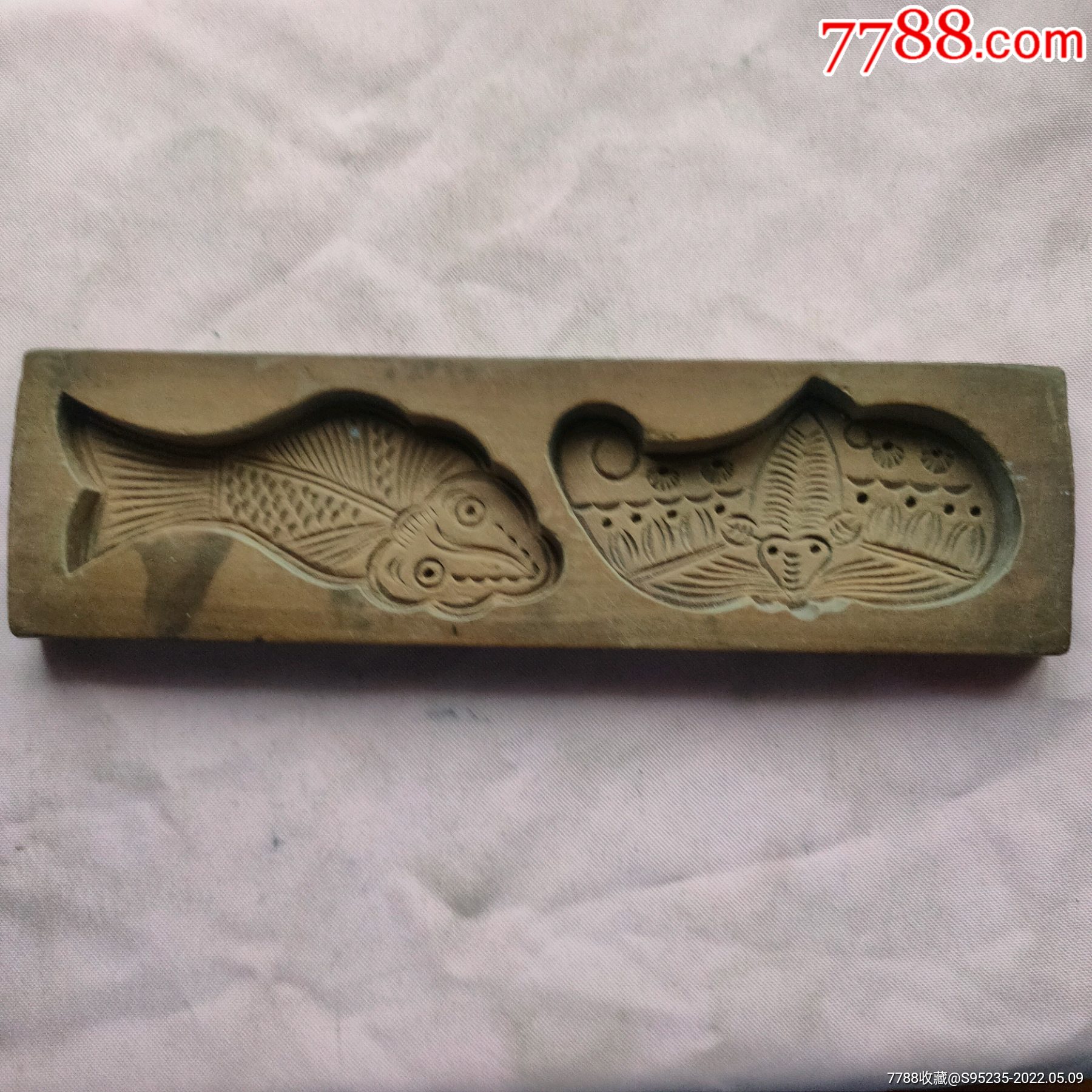 一块雕刻精美图案的印糕板