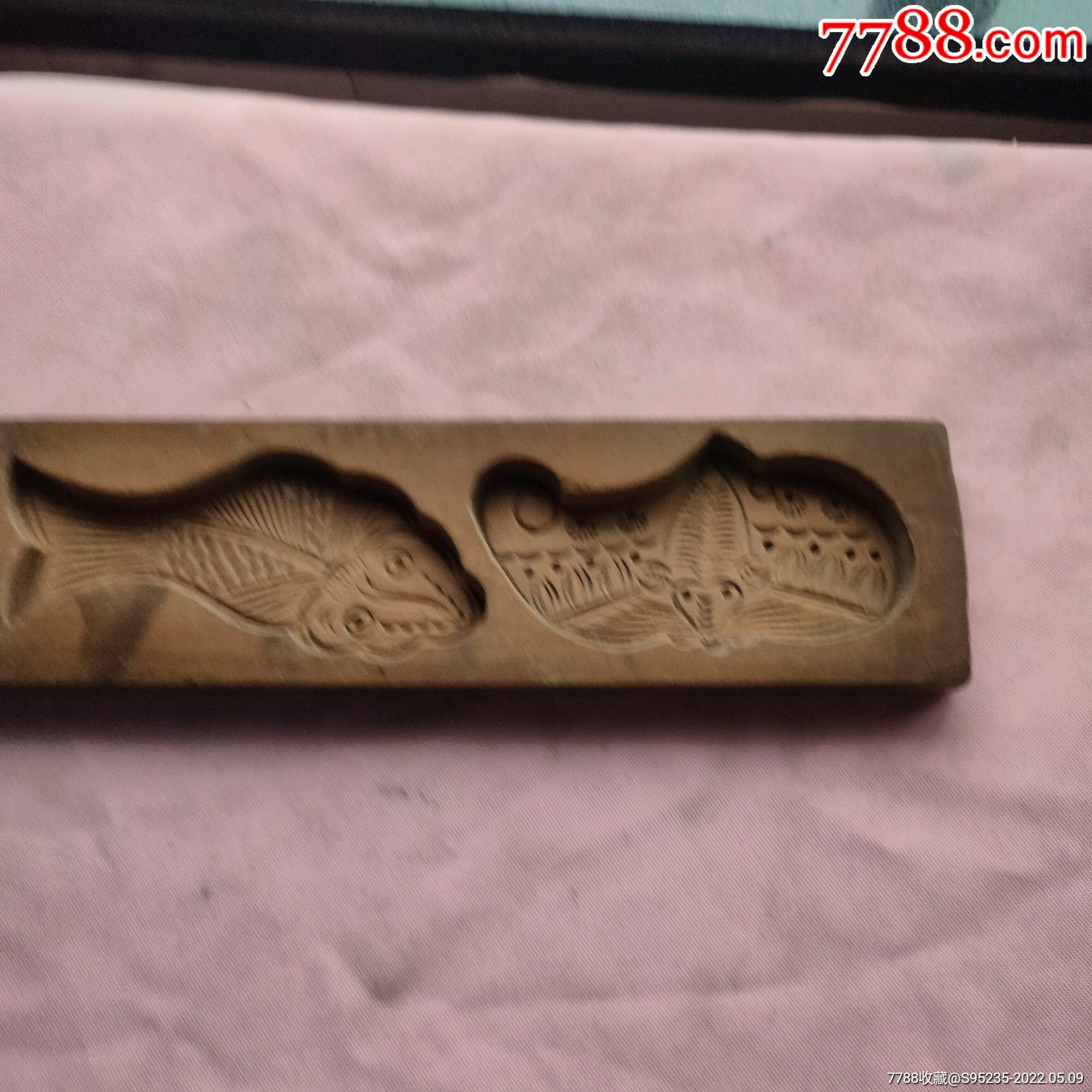 一块雕刻精美图案的印糕板