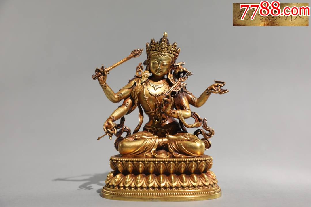 精铸铜胎鎏金四臂文殊菩萨坐像
