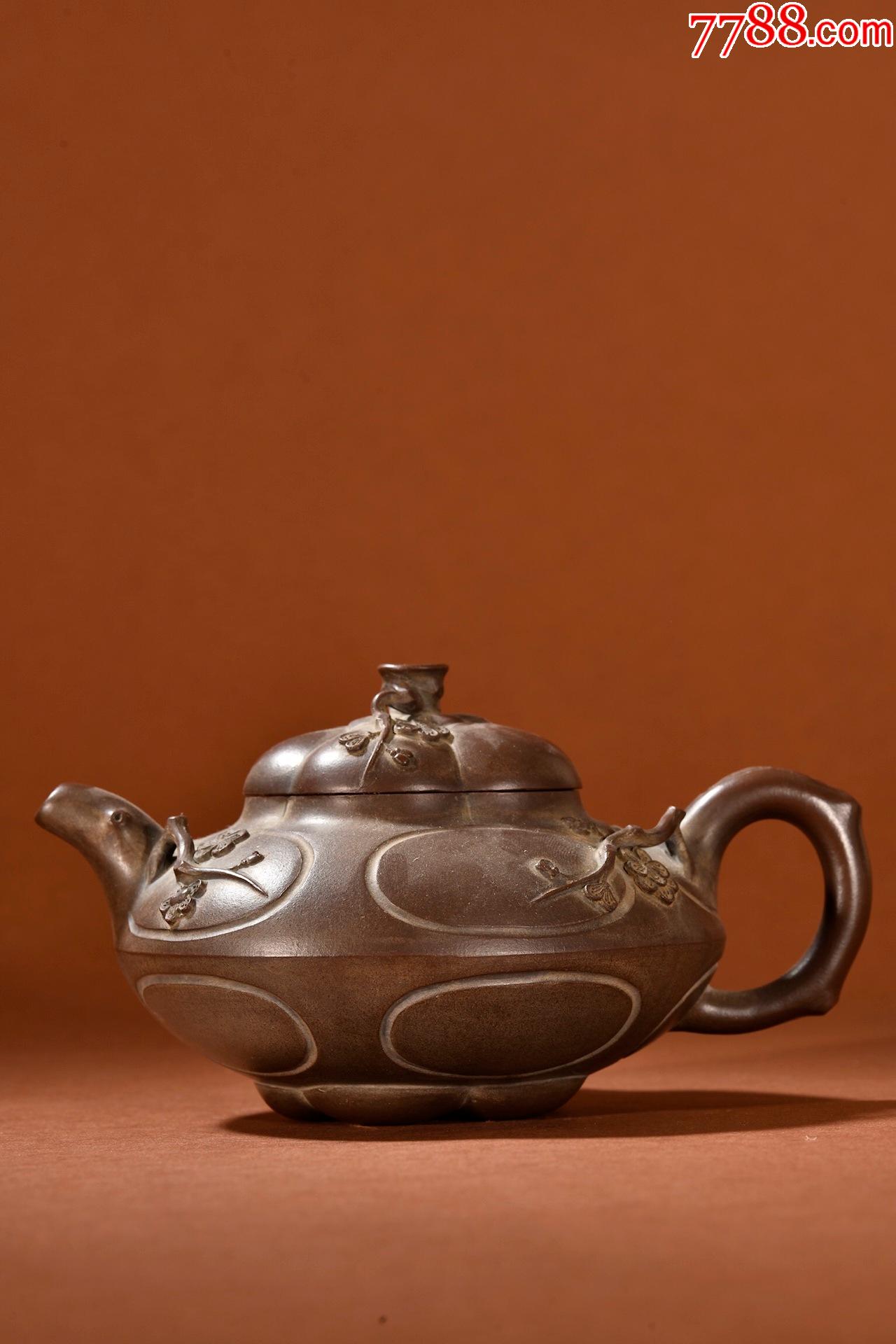 紫砂梅花纹茶壶