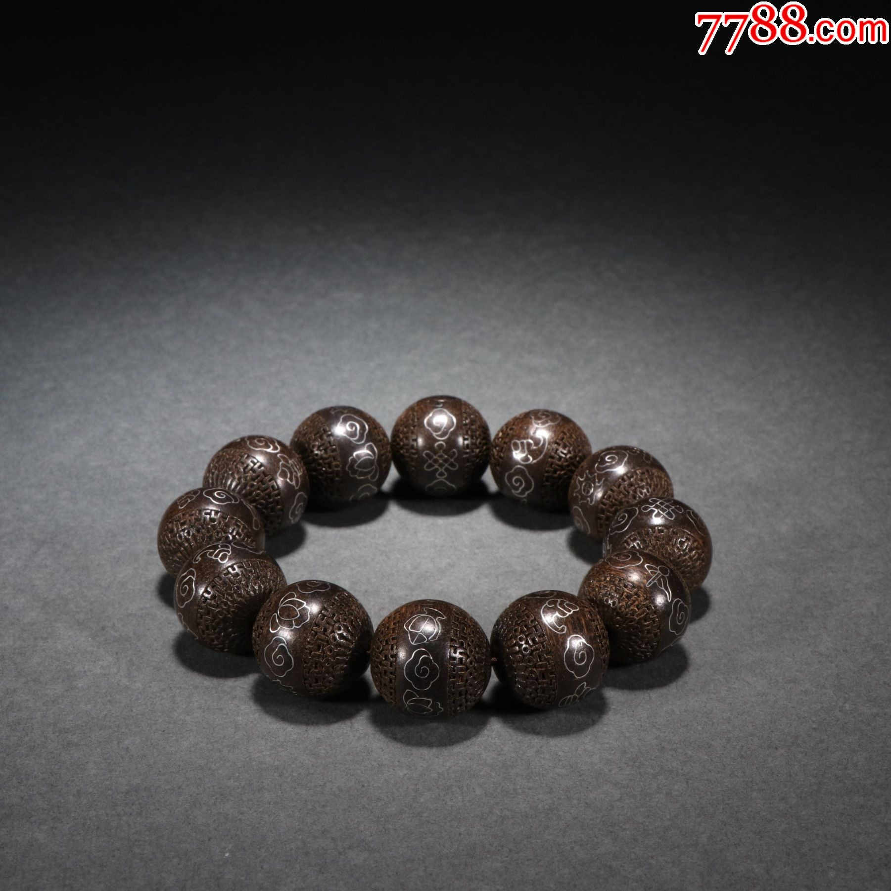 沉香镶银丝八宝纹手串