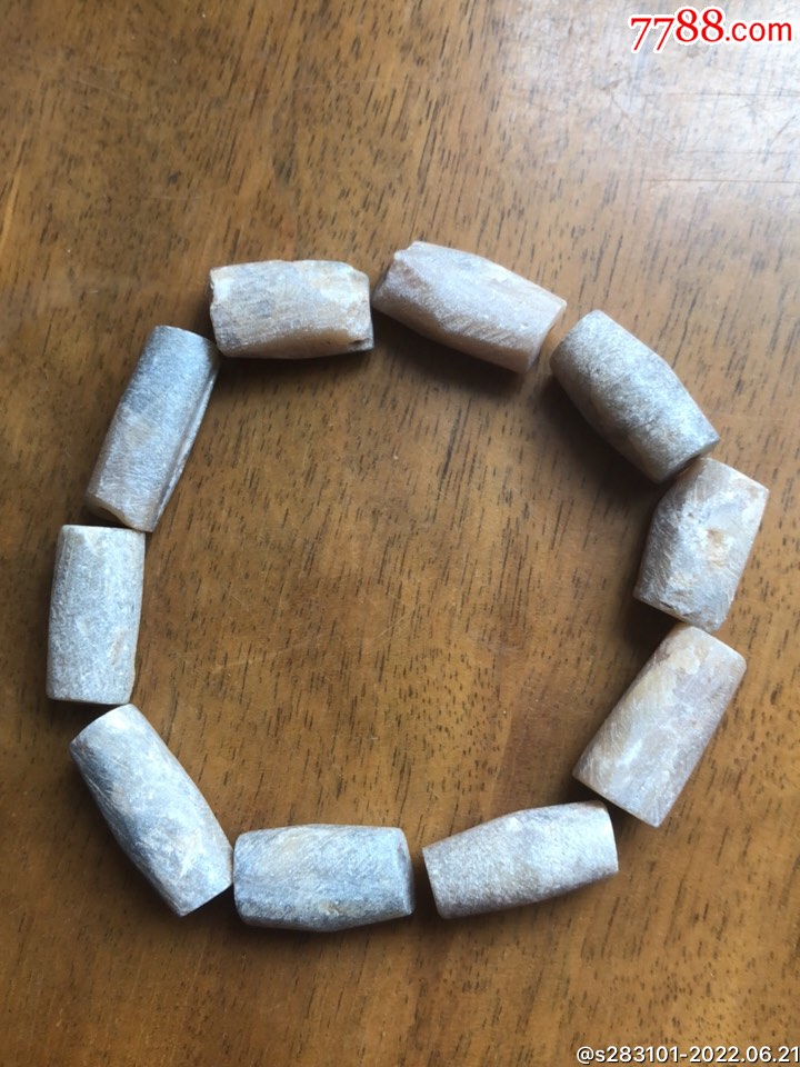 高古玉石管珠手串10颗,其中一颗尺寸长2.15,径1.