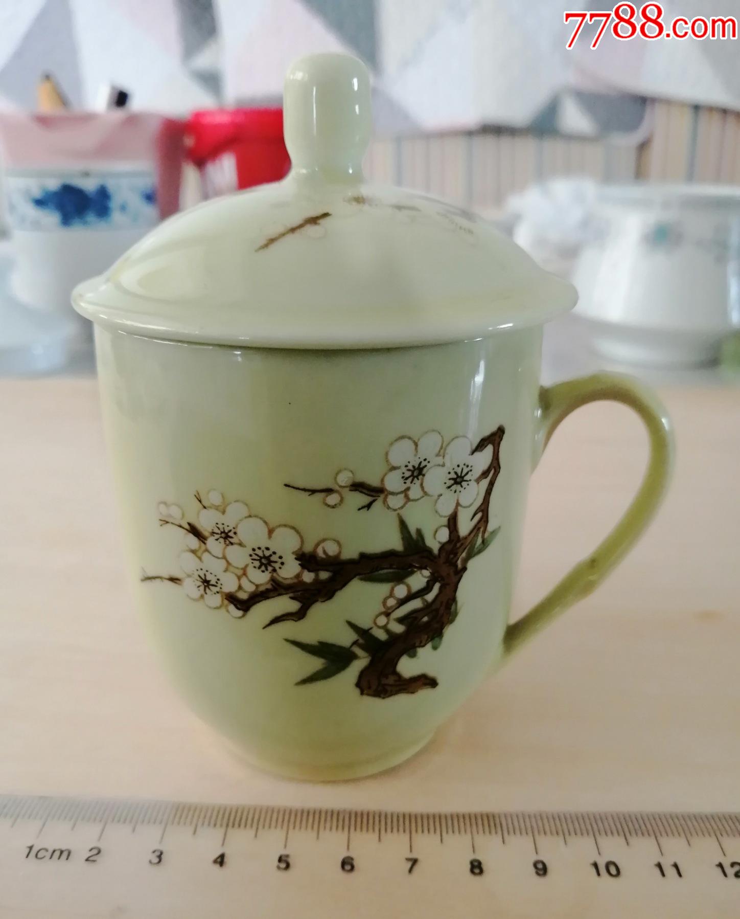 约八十年代,湖南醴陵瓷,黄釉梅花图案茶杯,中国国光底款,尺寸见图