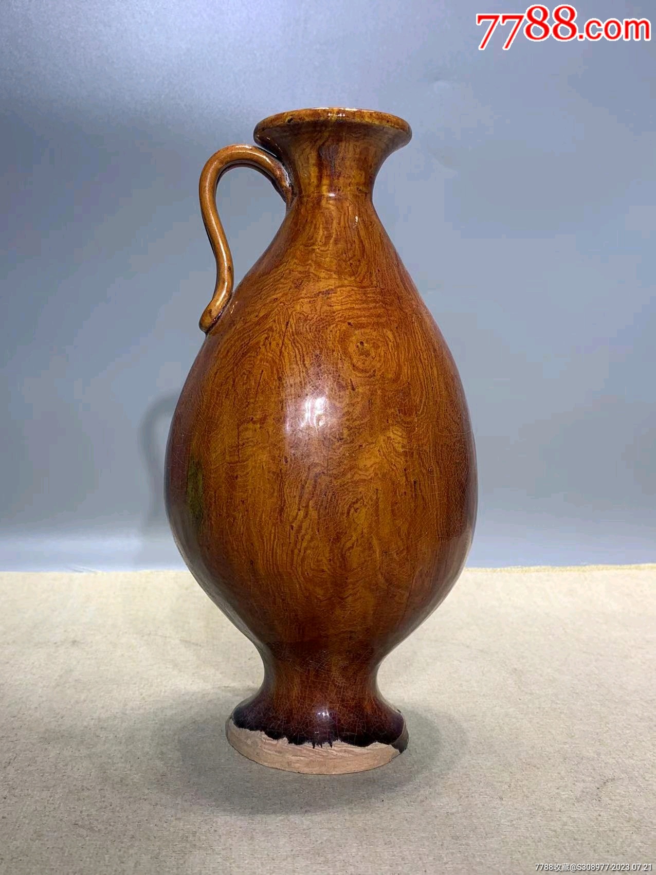 唐代绞釉酒壶-红釉瓷-7788红宝书