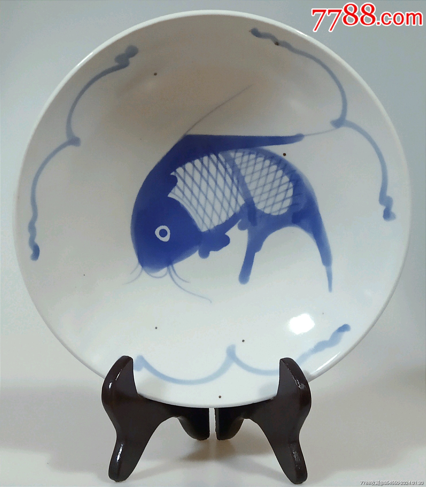 An extremely rare and superb blue and white 'dragon' dish