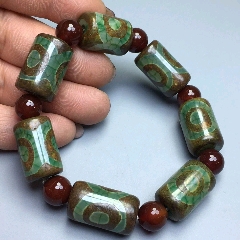 綠色三眼龍紋老天珠瑪瑙_新匯創(chuàng)億商行