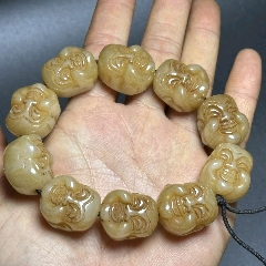 手工雕刻和田玉佛頭手串_新匯創(chuàng)億商行