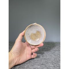 A Ding-type white-glazed lobbed cup stand, Northern Song