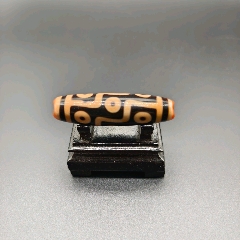 藏传红砂折线九眼天珠-天珠-7788硅化木