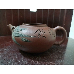 江建祥制紫砂壶一把，全手工制作，线条流畅，比例匀称，气韵生动。（品