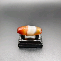 藏传红砂折线九眼天珠-天珠-7788硅化木