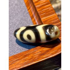 藏传牙黄莲花三眼天珠_天珠_图片价格_收藏鉴定_7788钱币网