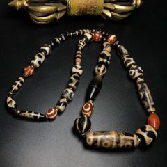 藏区回流老料高油包浆红肉四眼天珠搭配多宝天珠精心编制项链_天珠_图片