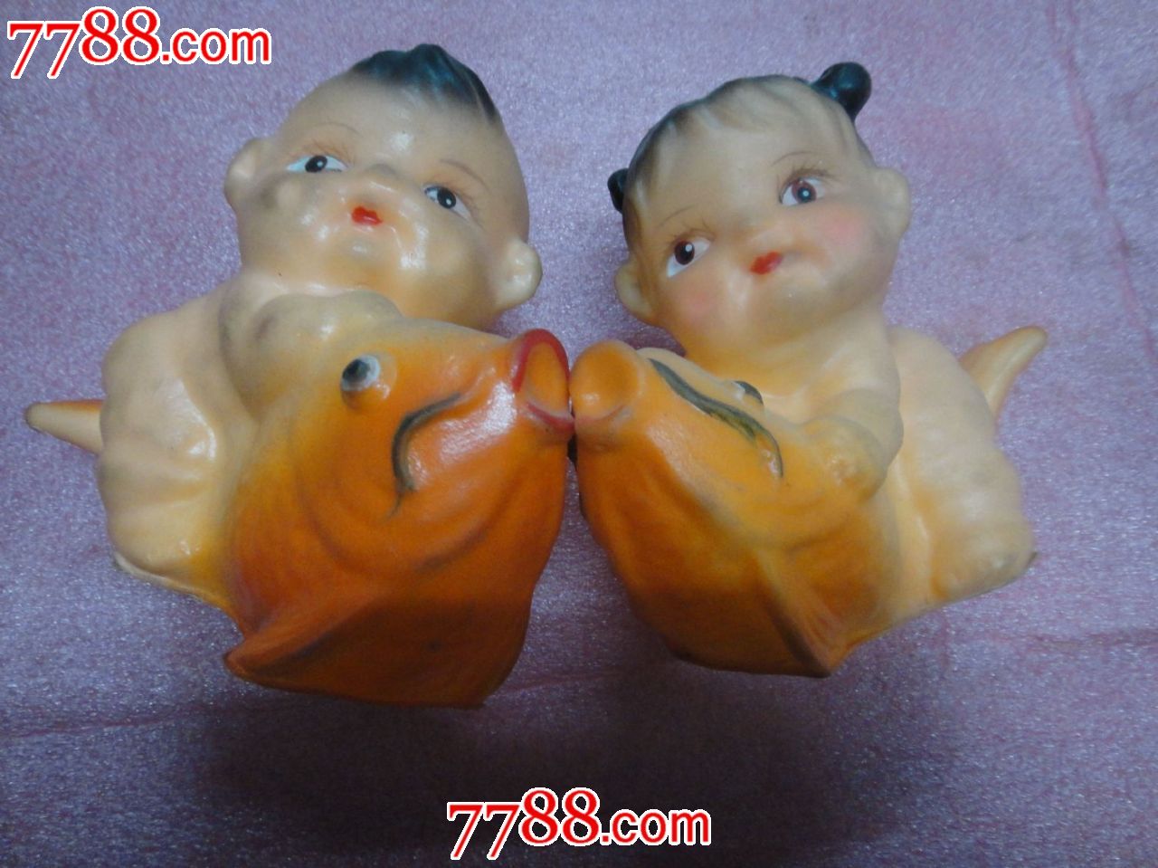 骑鱼的童男童女