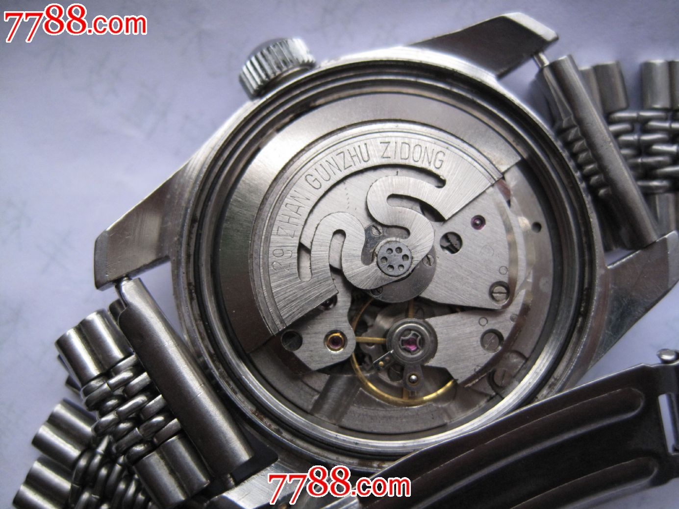 卖块宝贝----罕见29钻上海军表捐给家乡修路