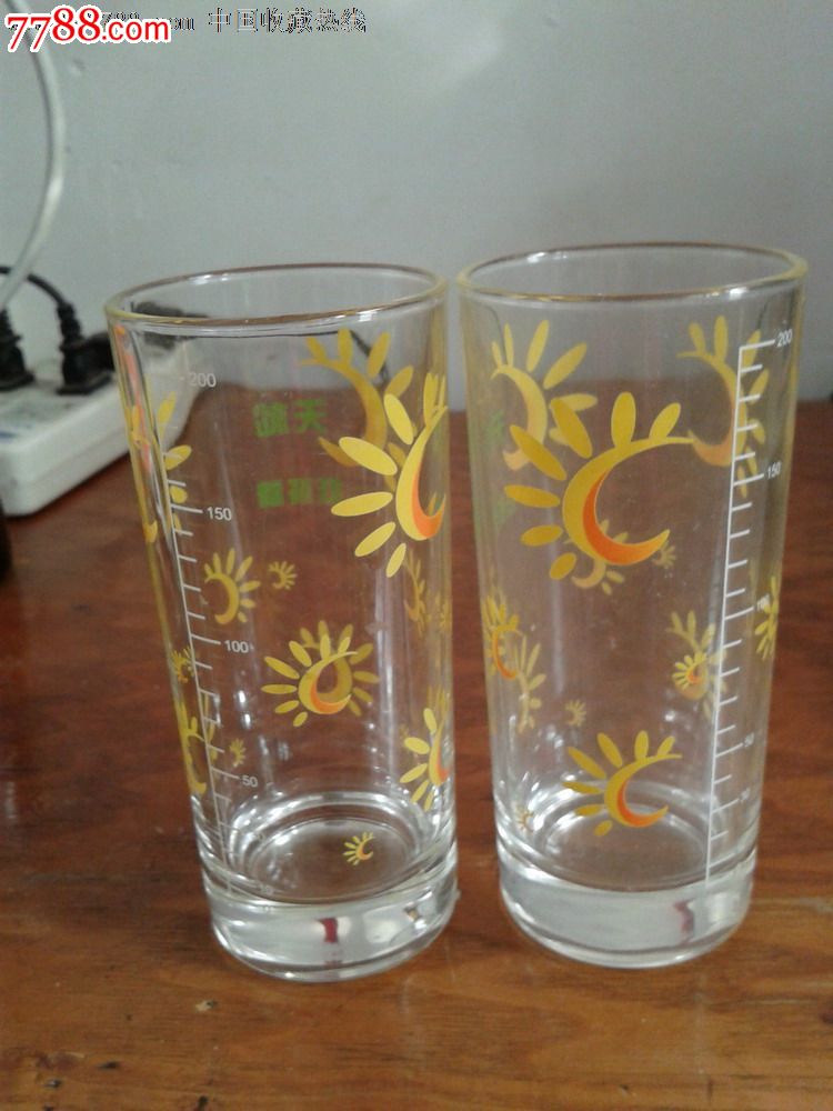 带刻度的太阳花玻璃杯