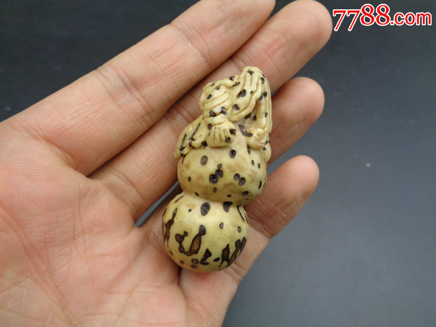 千眼菩提雕富贵长生手把件