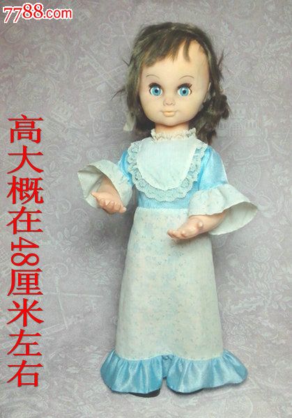 香港手动上弦八音盒并可转动身体眨眼睛的女生娃娃