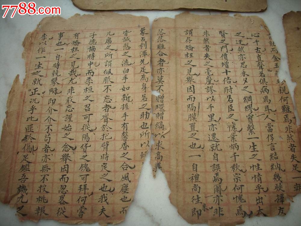 背面写有老药铺【万育堂,恒心堂】名号