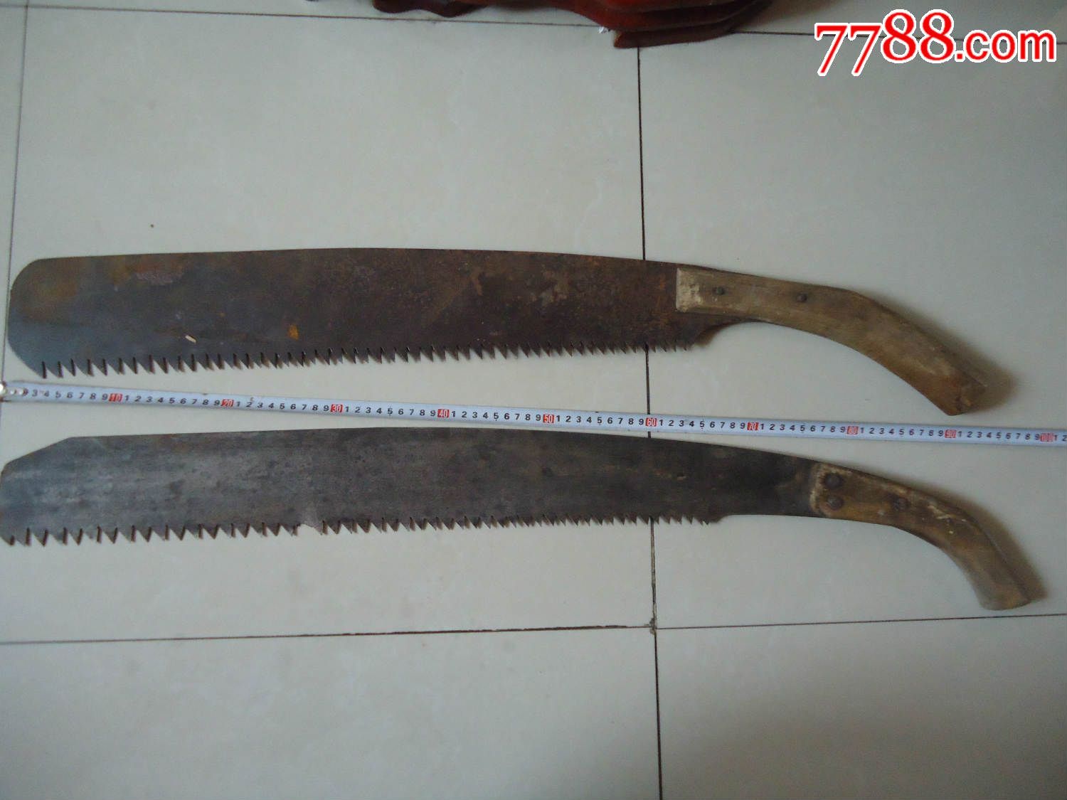 两把老歪把子大铁锯