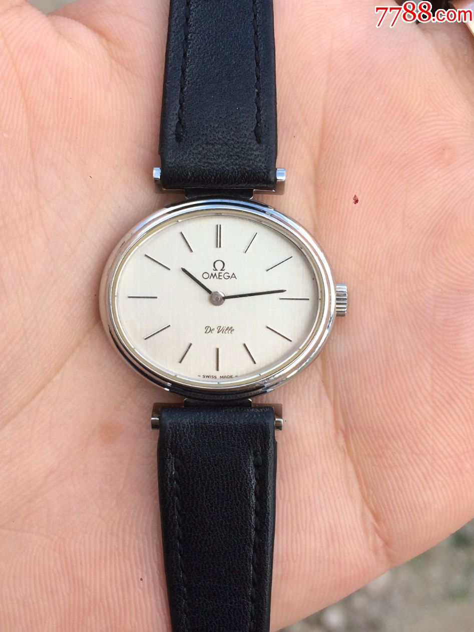 欧米茄蝶飞包白金手动机械女表