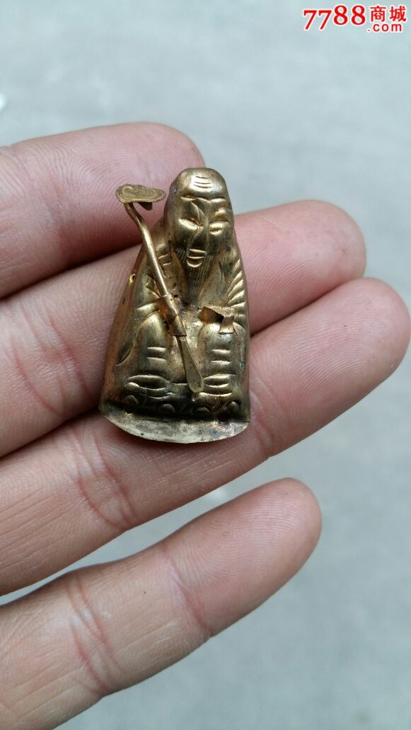 鎏金人物手拿如意