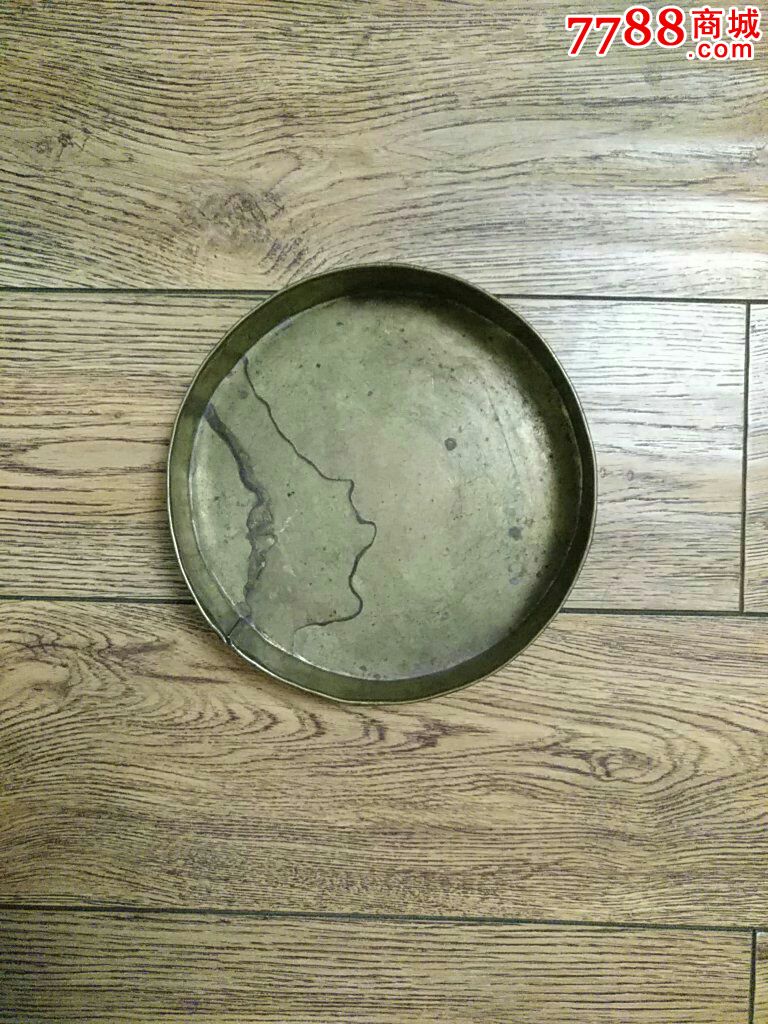 早期手工打制铜旋子