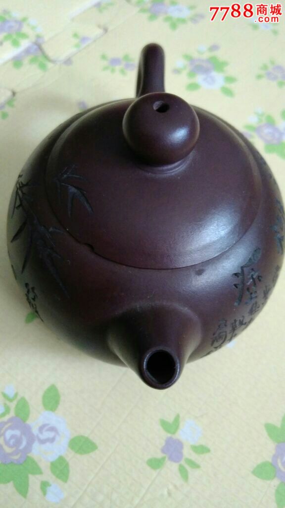 许艳萍紫砂网球壶石陶刻