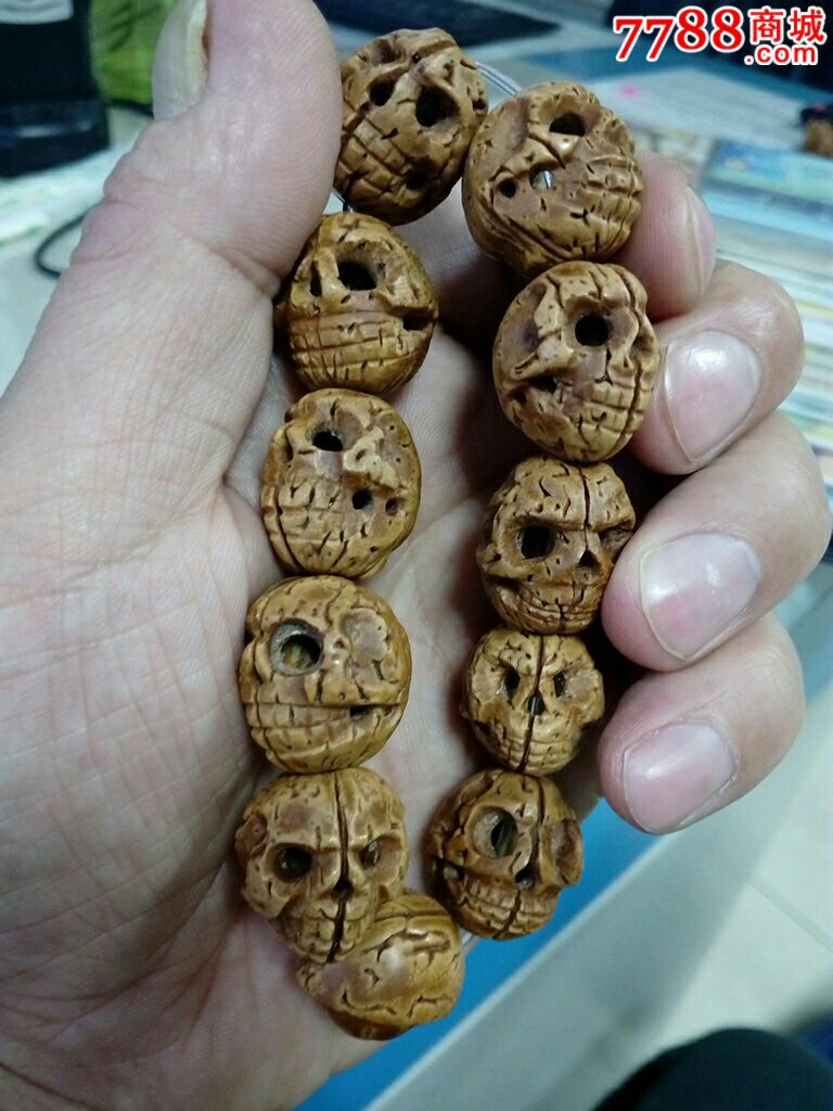 桃核雕刻骷髅头手串