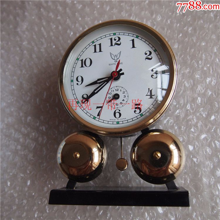 白鸽双铃马蹄表