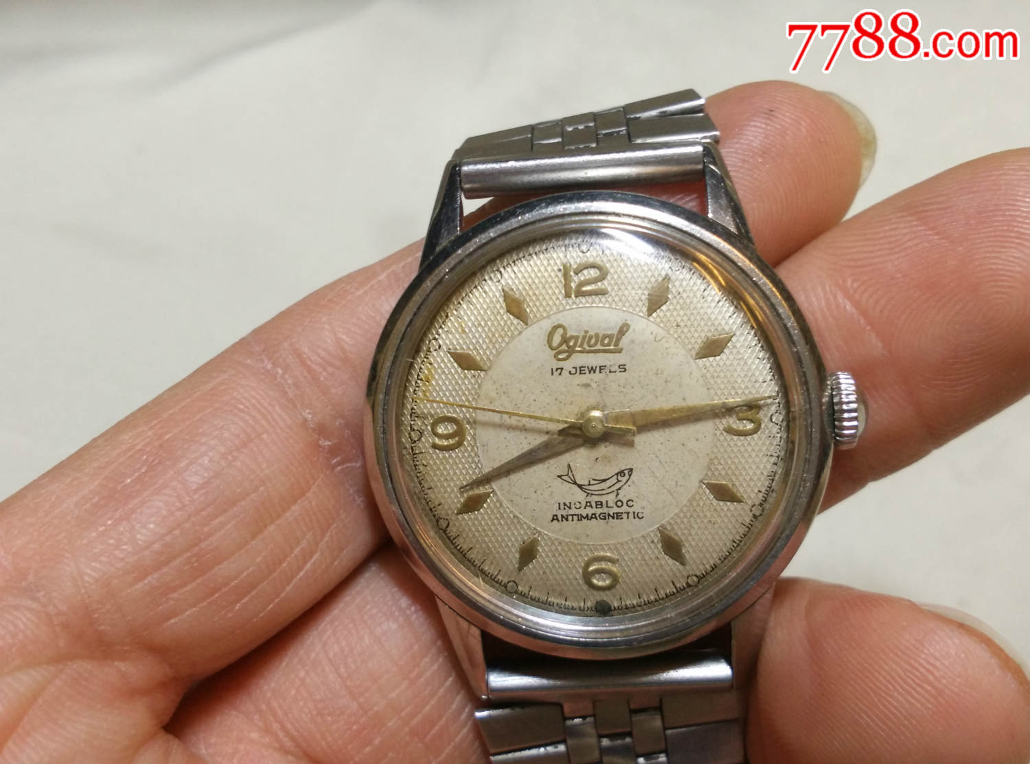 低售块布纹面的很少见老瑞士奥琦华小鱼表一块!机芯带小魔鱼暗记的!